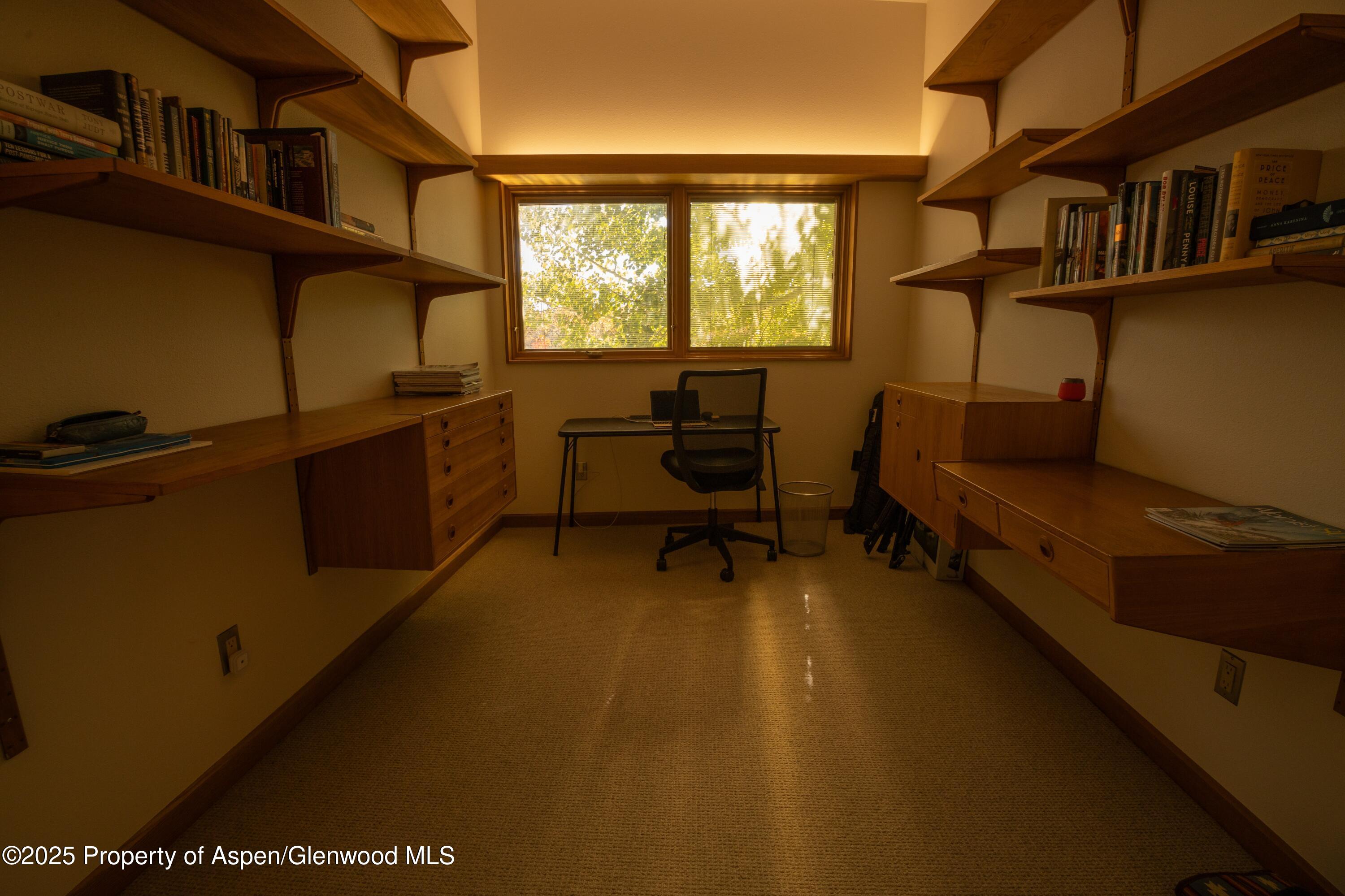 623 Johnson Drive Aspen, CO 81612 - Photo 18 of 35 a living room with furniture and a window