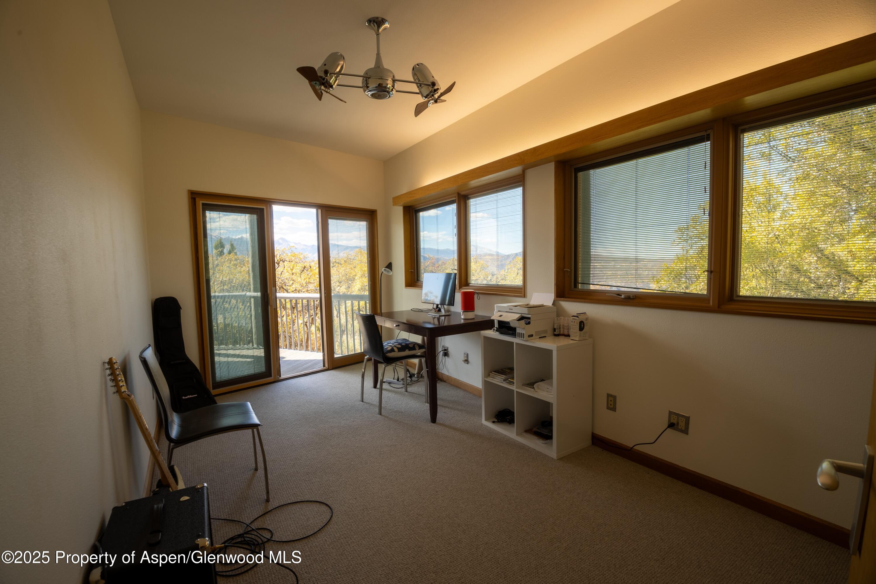 623 Johnson Drive Aspen, CO 81612 - Photo 22 of 35 a view of a livingroom with furniture and a window