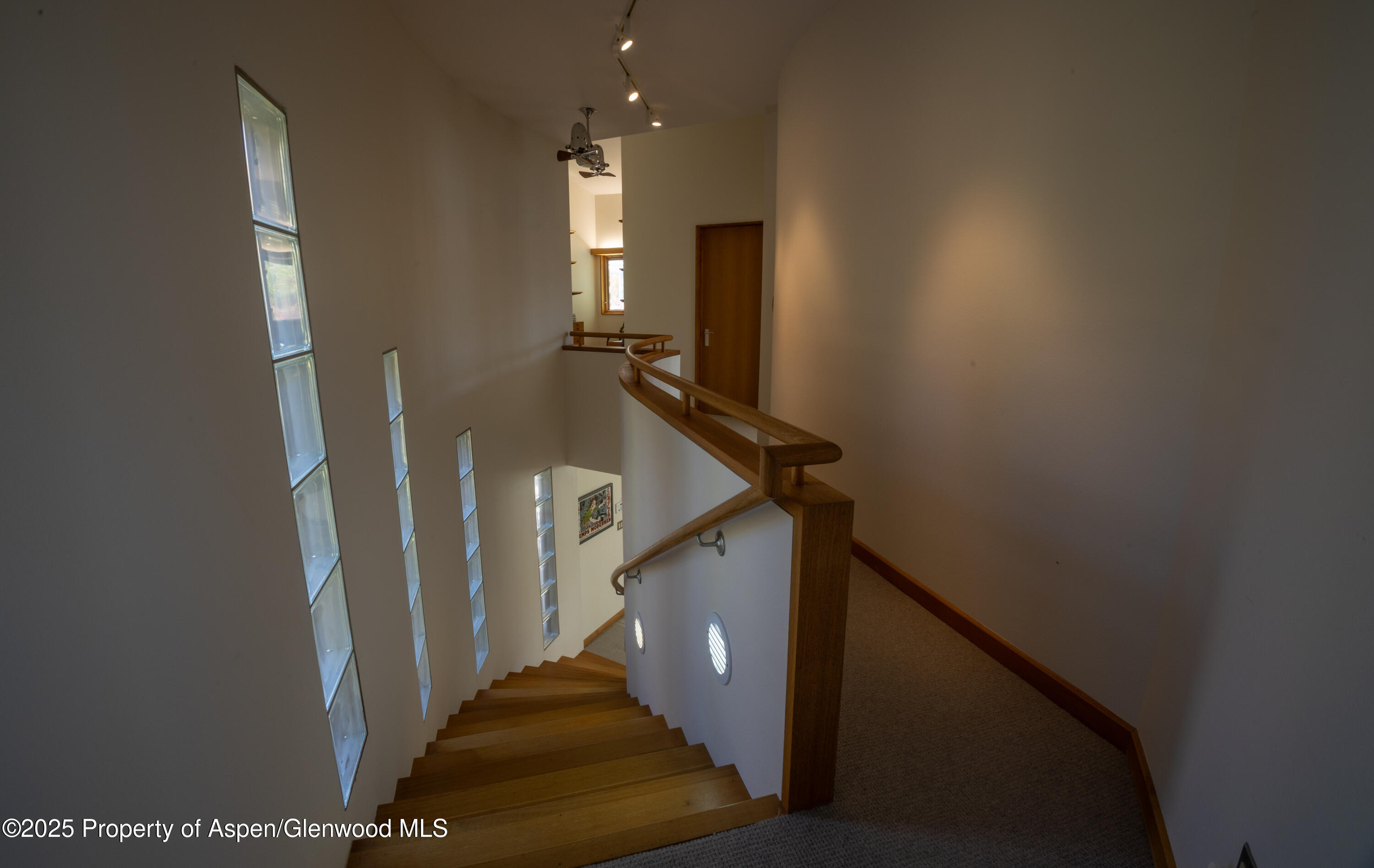 623 Johnson Drive Aspen, CO 81612 - Photo 23 of 35 a view of entryway and hall with wooden floor