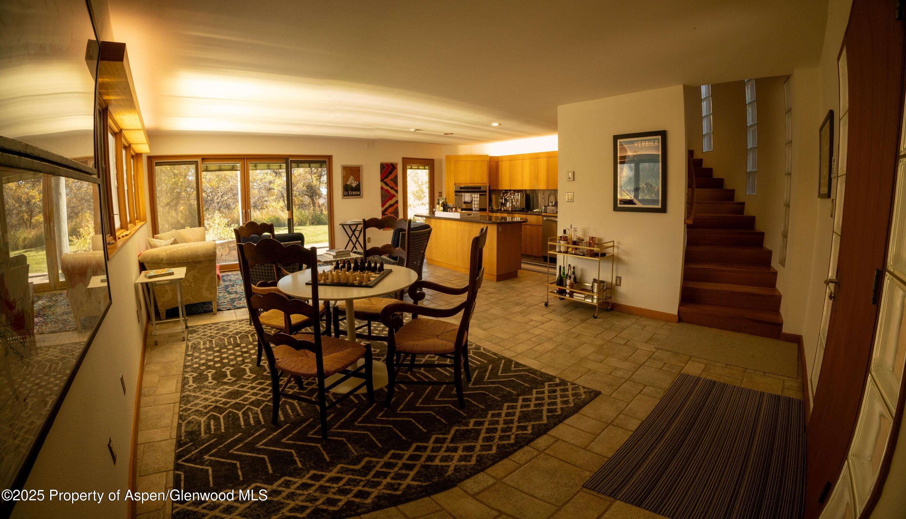623 Johnson Drive Aspen, CO 81612 - Photo 24 of 35 a view of a dining room with furniture window and outside view