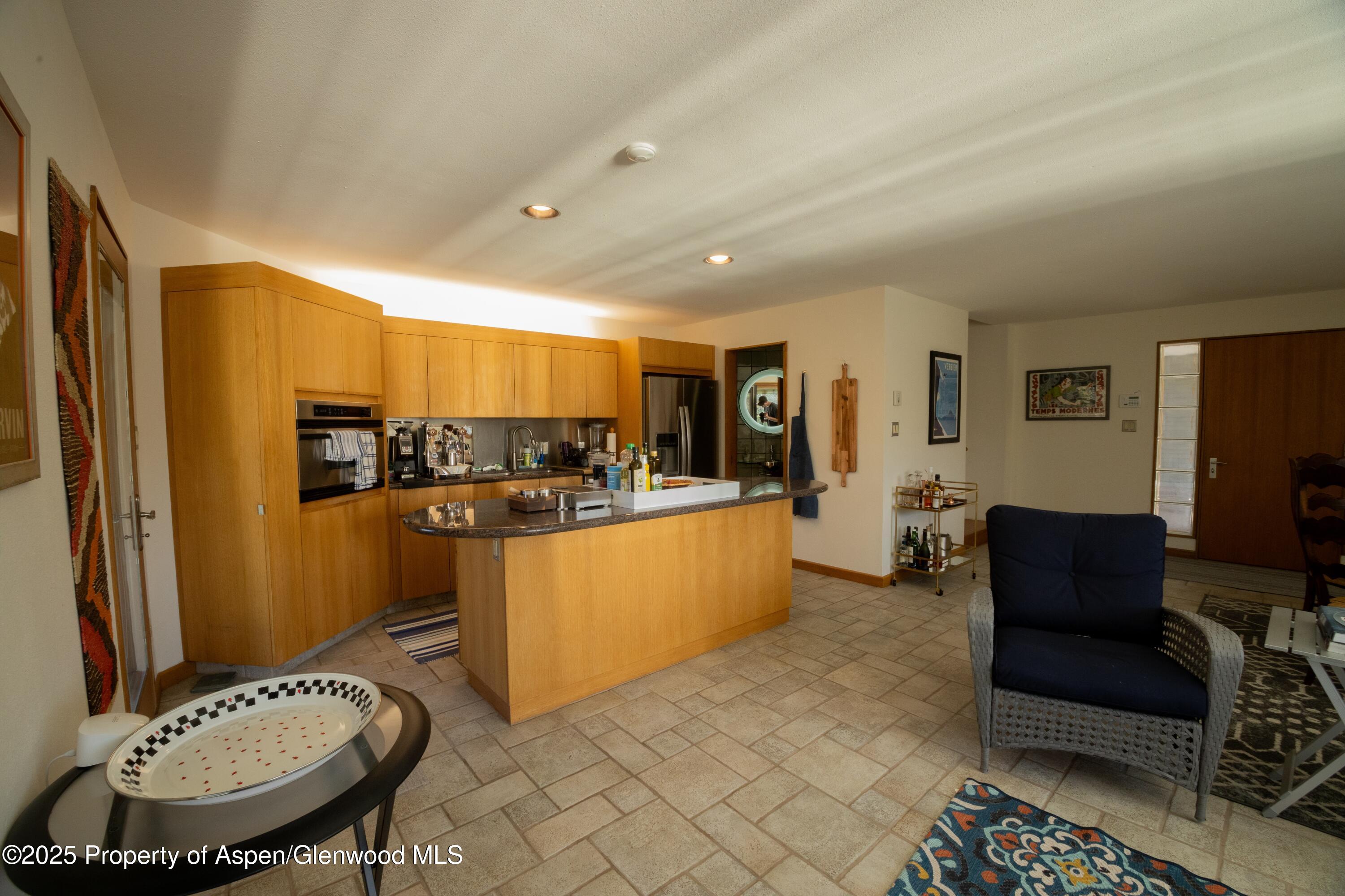 623 Johnson Drive Aspen, CO 81612 - Photo 25 of 35 a living room with furniture and a wooden floor