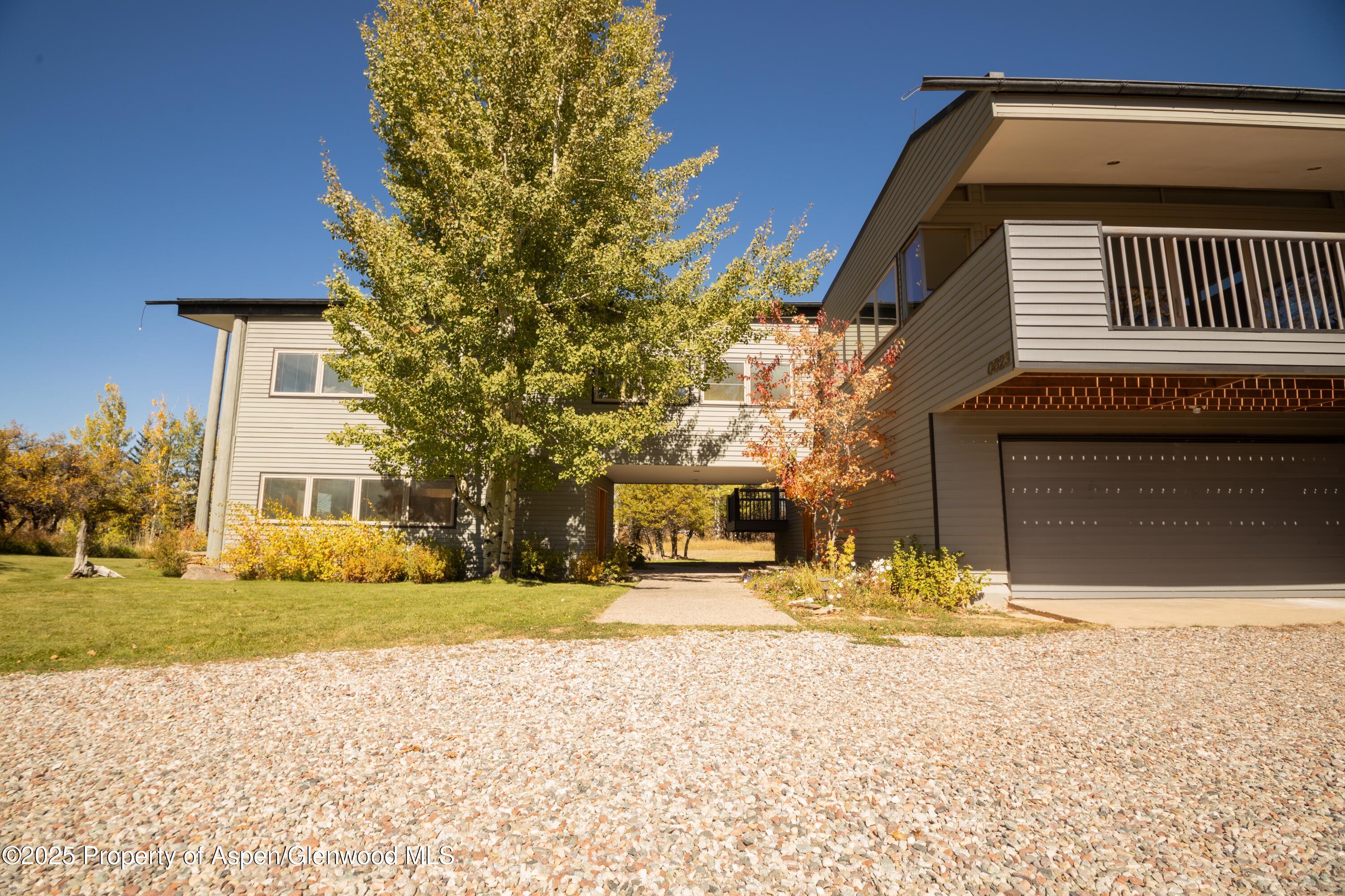 623 Johnson Drive Aspen, CO 81612 - Photo 29 of 35 a view of a house with snow on the road