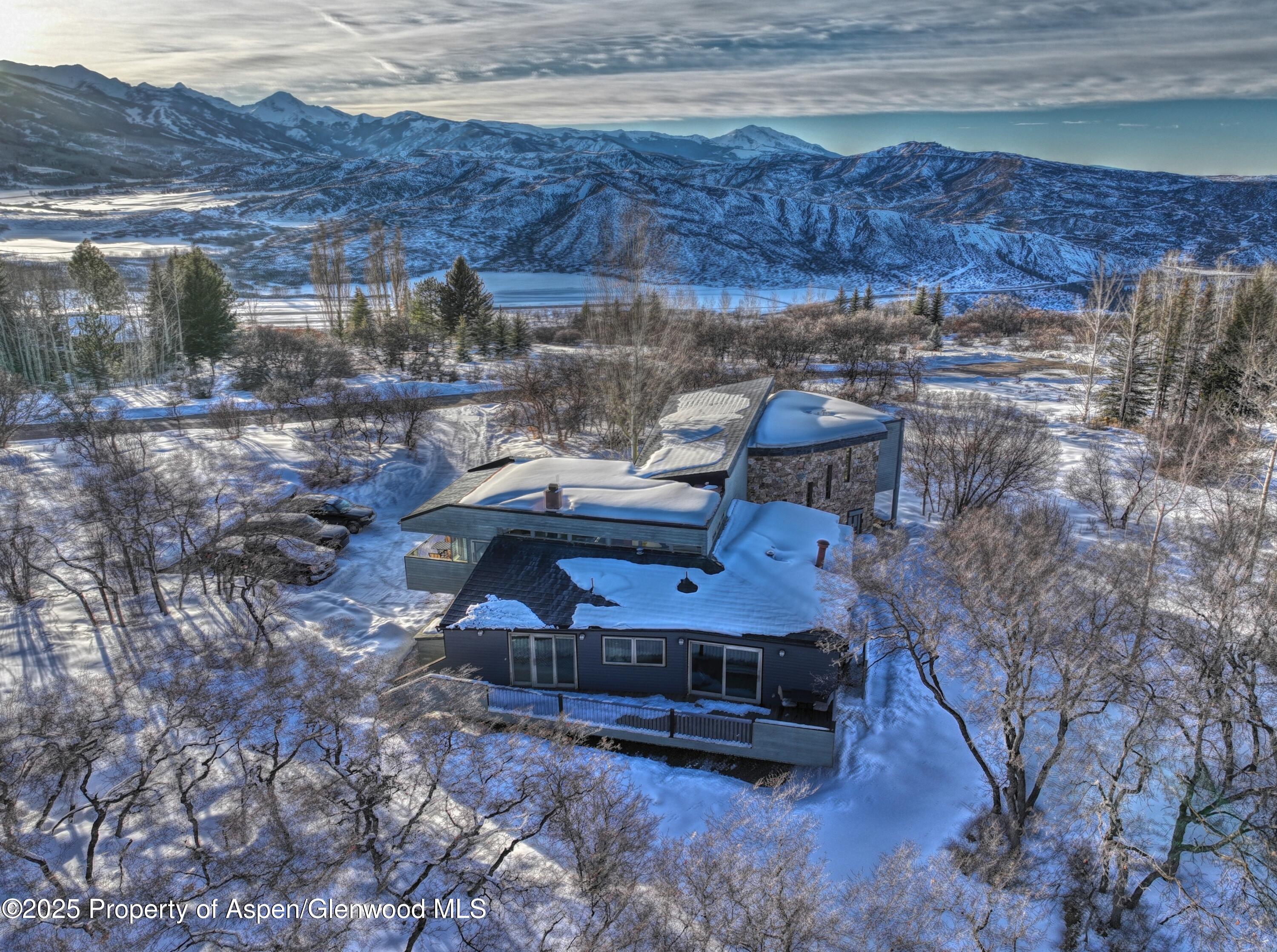 623 Johnson Drive Aspen, CO 81612 - Photo 6 of 35 a view of a house with a yard