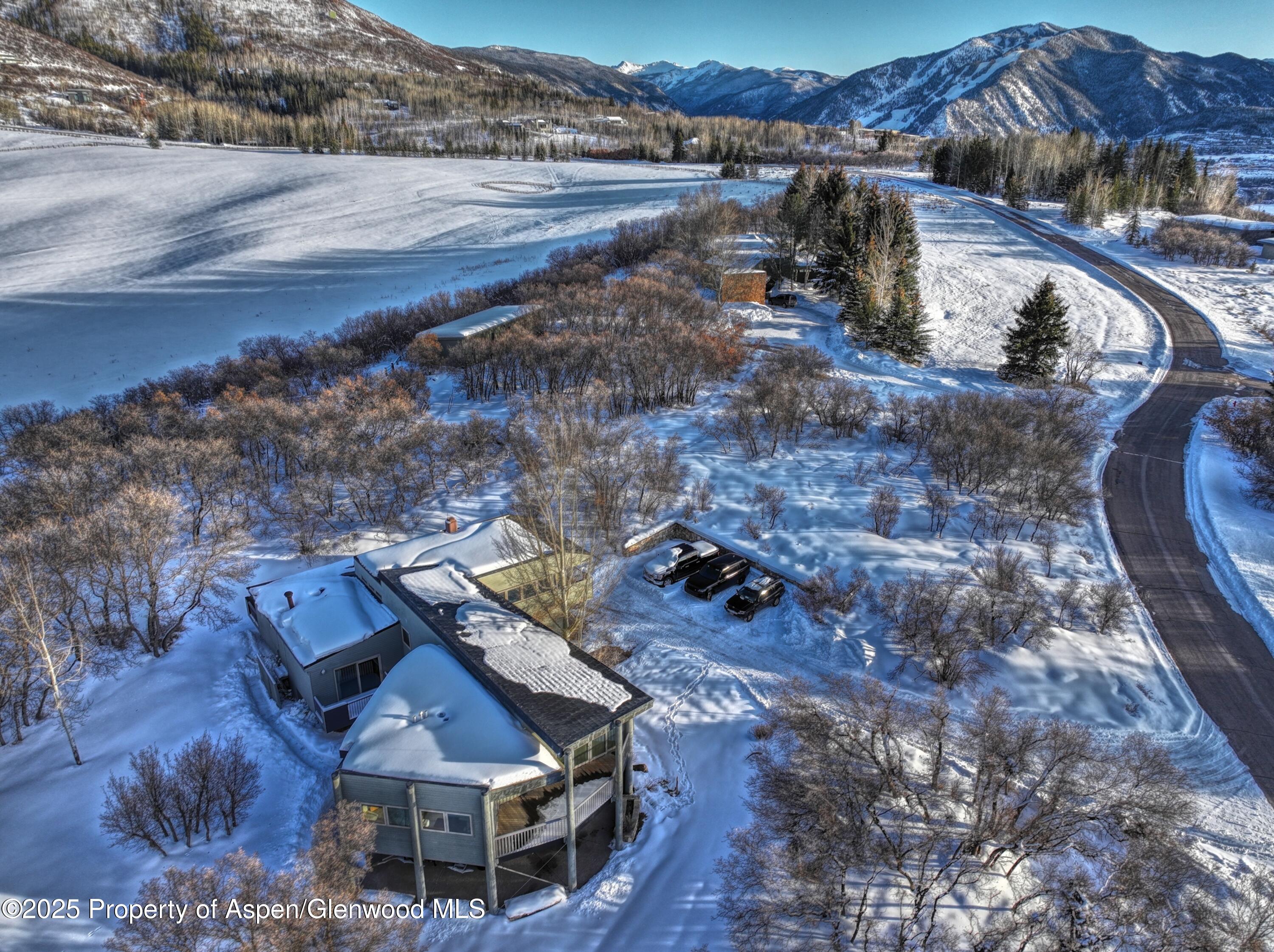 623 Johnson Drive Aspen, CO 81612 - Photo 7 of 35 a view of a house with a yard