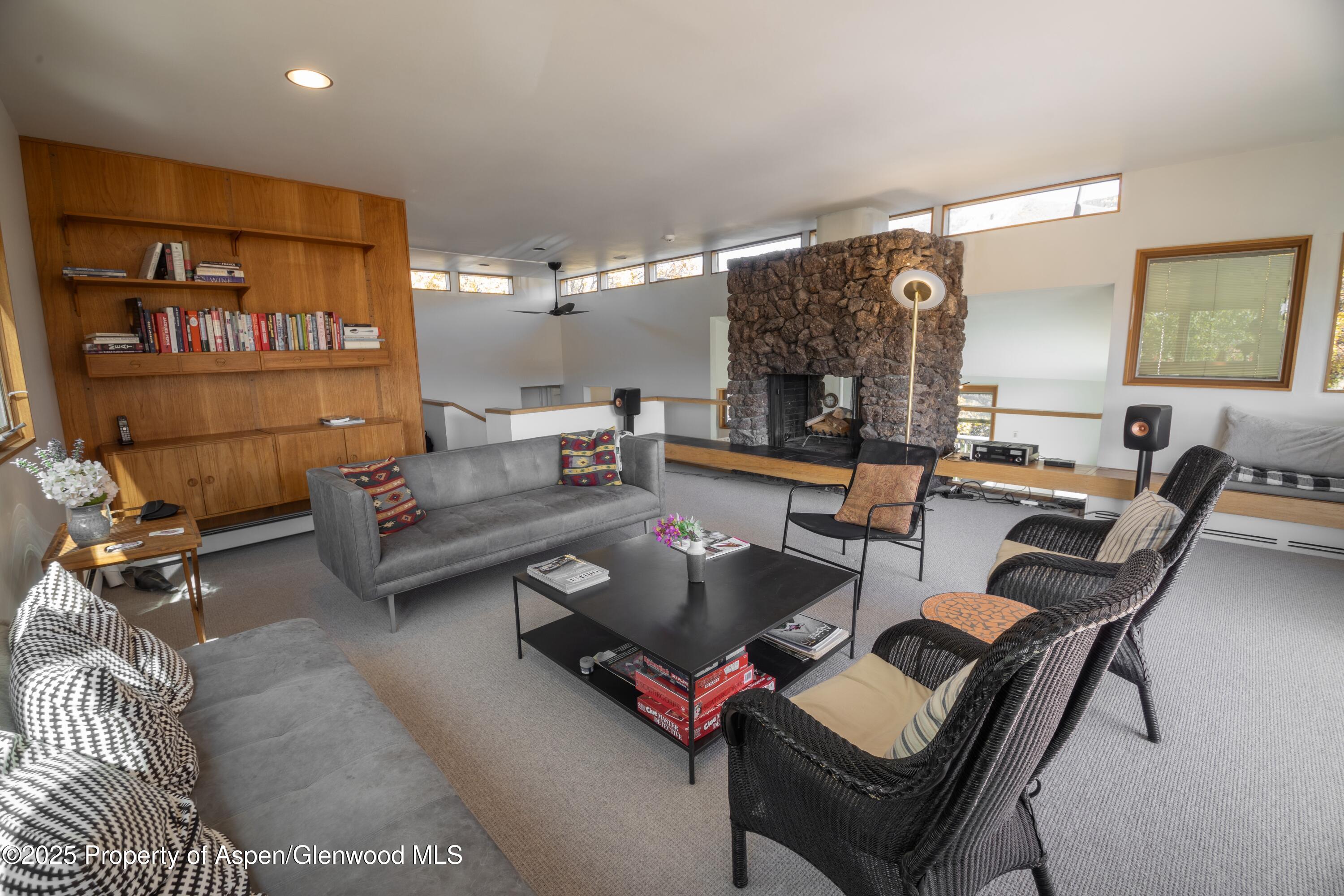 623 Johnson Drive Aspen, CO 81612 - Photo 10 of 35 a living room with furniture and a large window