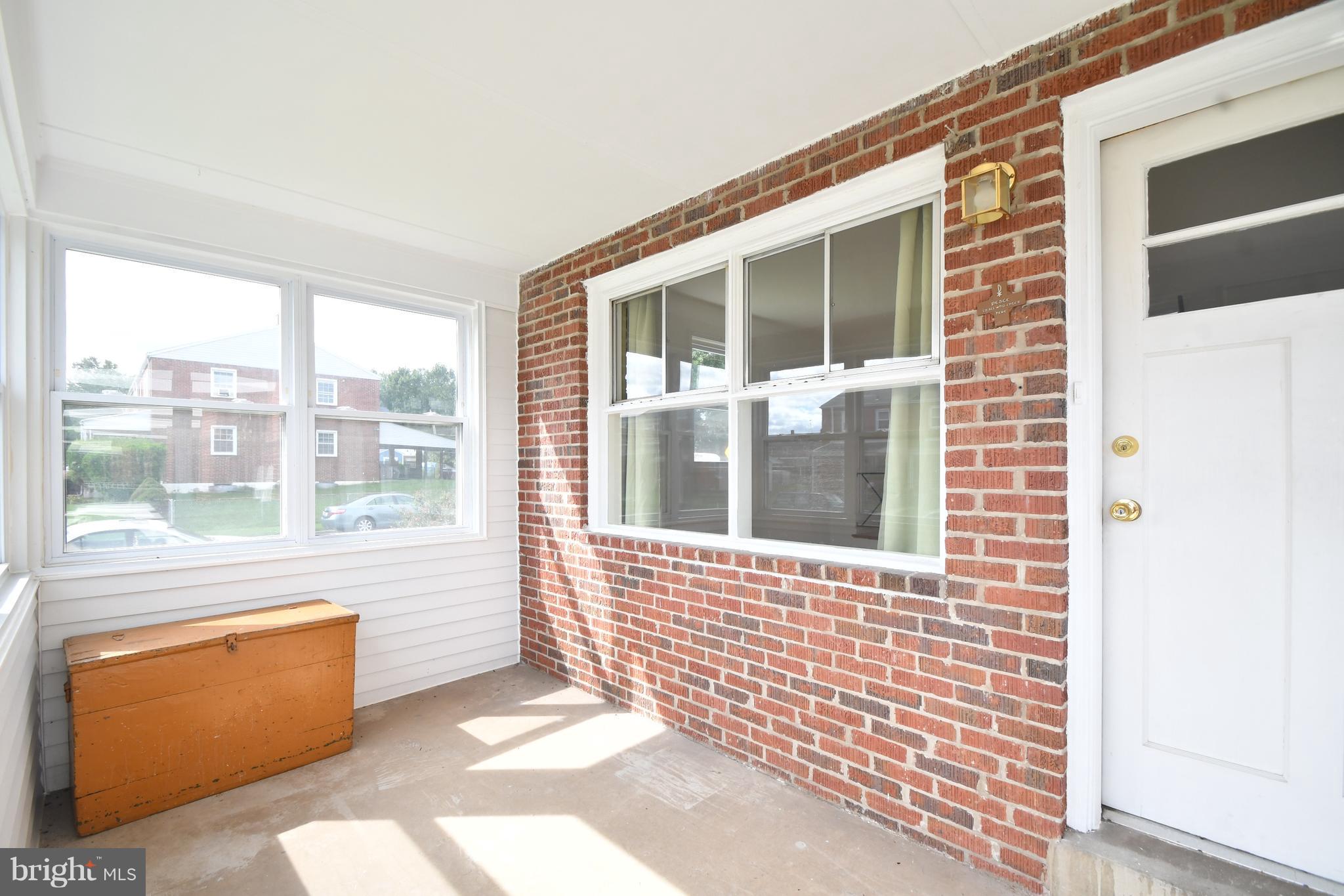1762 Stokesley Road Baltimore, MD 21222 - Photo 2 of 30 Front sun room with screens/storm windows.