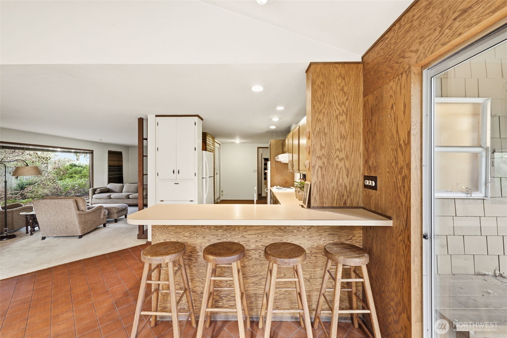 20319 92nd Avenue West Edmonds, WA 98020 - Photo 10 of 26 a view of a dining room with furniture and a large window