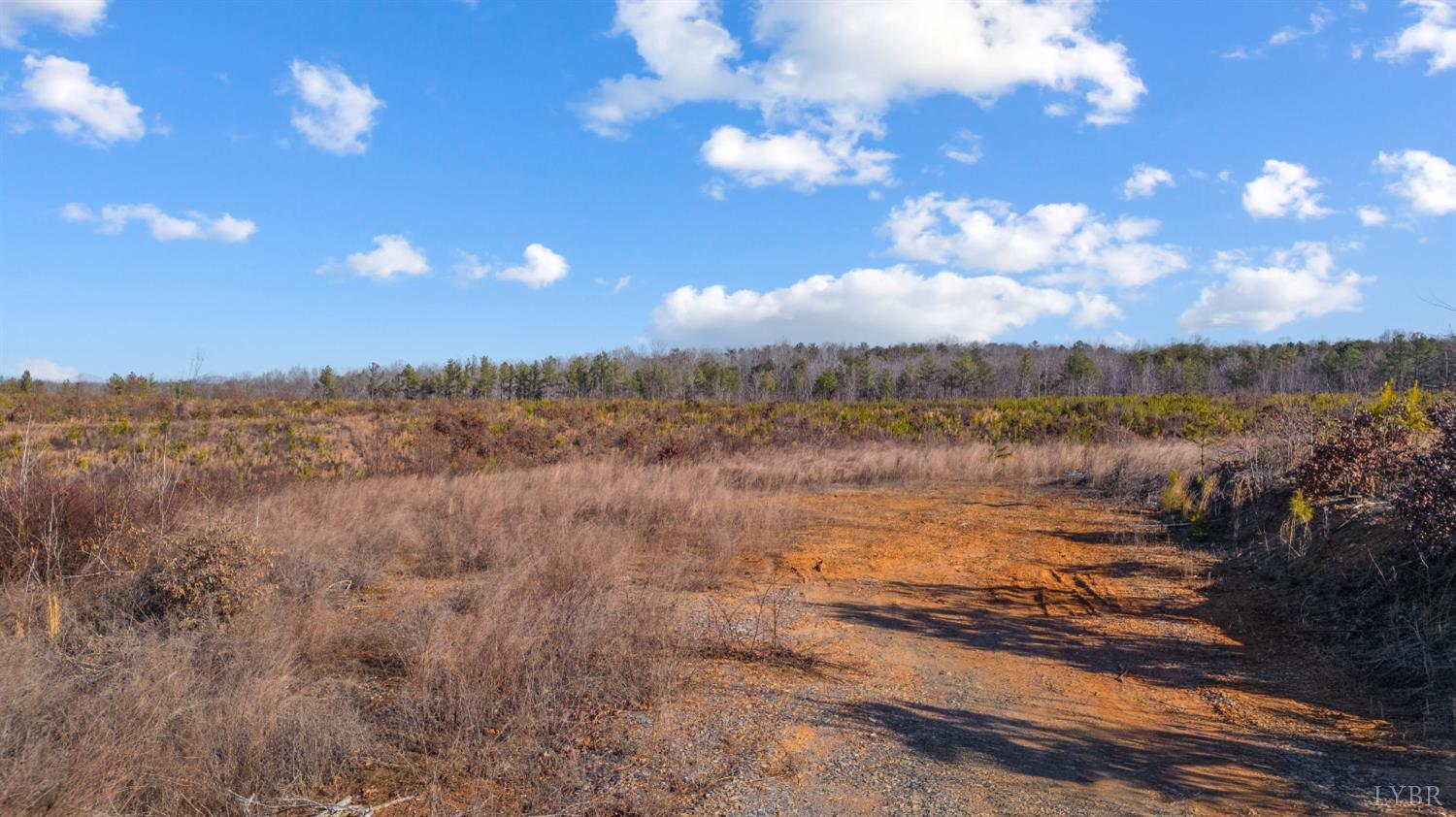 0 Evington Road Evington, VA 24550 - Photo 3 of 22 a view of a lake and sunset