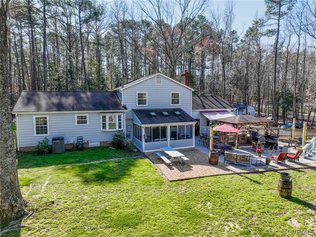 6720 Greenyard Road Chester, VA 23831 - Photo 20 of 46 a front view of a house with garden