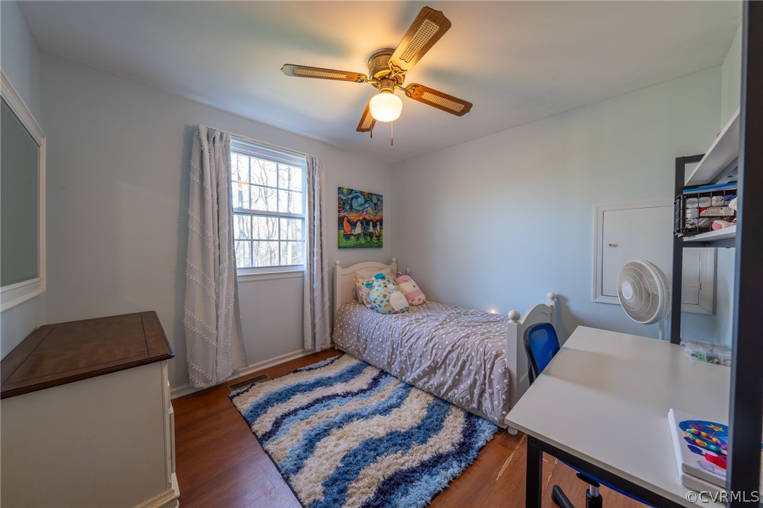6720 Greenyard Road Chester, VA 23831 - Photo 36 of 46 a bedroom with two beds and a window