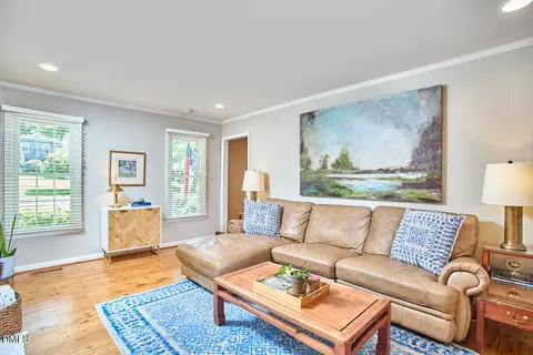 a living room with furniture and a couch