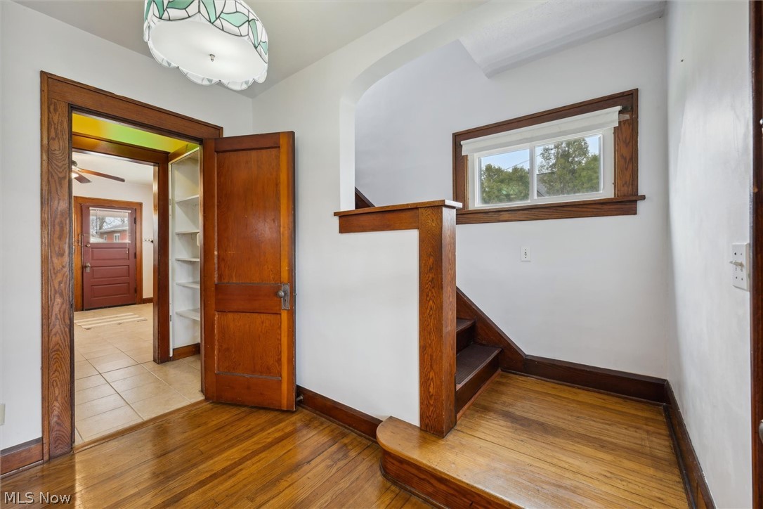 64 West Bagley Road Berea, OH 44017 - Photo 13 of 48 Stairs featuring ceiling fan and light hardwood / wood-style floors