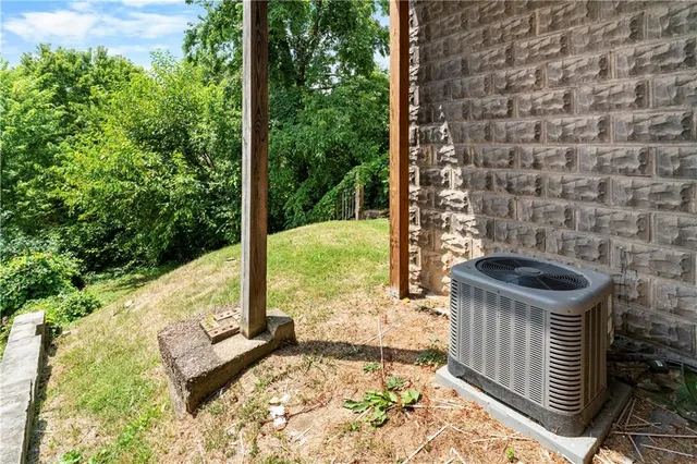 a view of a yard with chairs