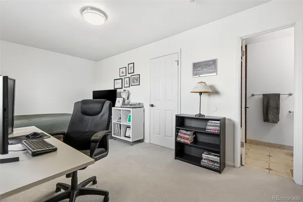 a view of workspace with lounge chair