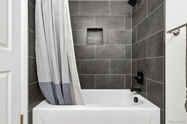 a bathroom with a bathtub