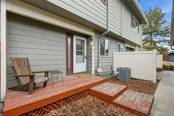 a backyard of a house with seating space