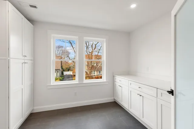 an empty room with windows