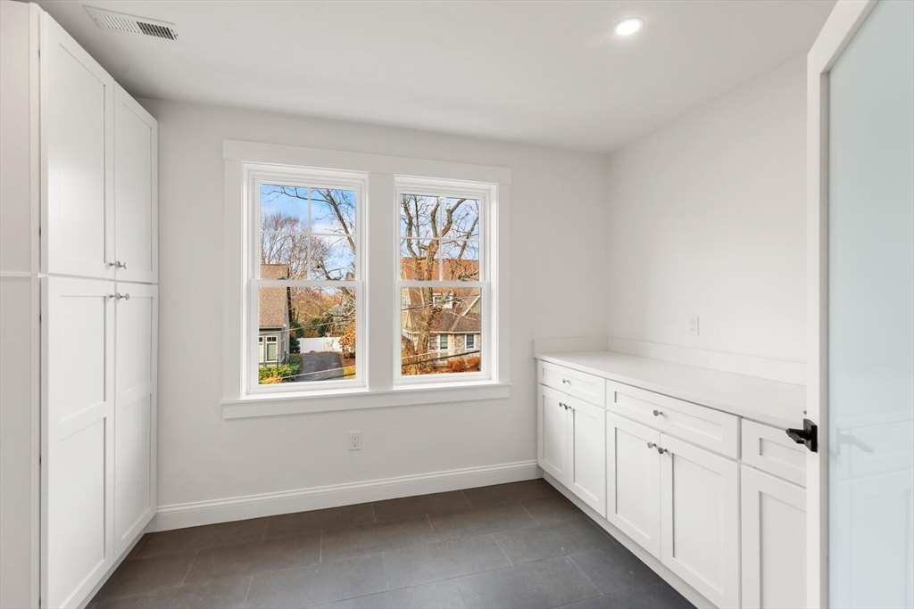 19 Town Way Winchester, MA 01890 - Photo 22 of 42 an empty room with windows