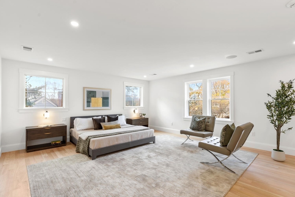 19 Town Way Winchester, MA 01890 - Photo 24 of 42 a living room with furniture and a large window