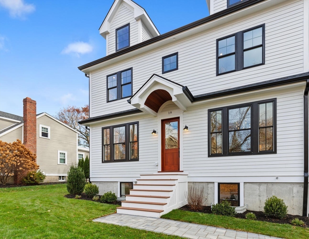 19 Town Way Winchester, MA 01890 - Photo 3 of 42 a front view of a house with garden