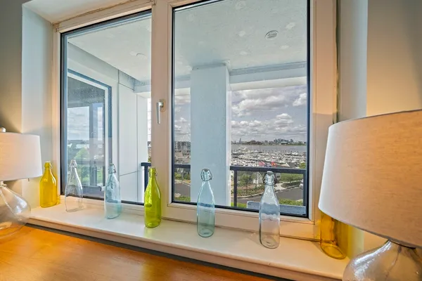 a kitchen with stainless steel appliances a sink stove refrigerator and cabinets