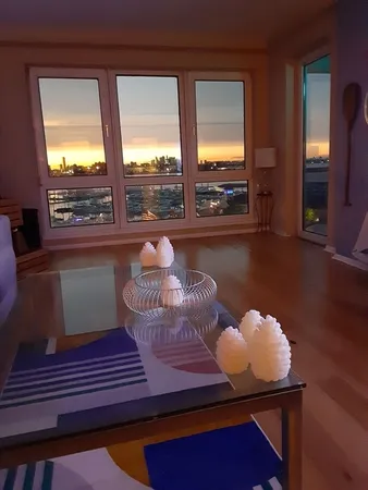 a room with furniture and a large window