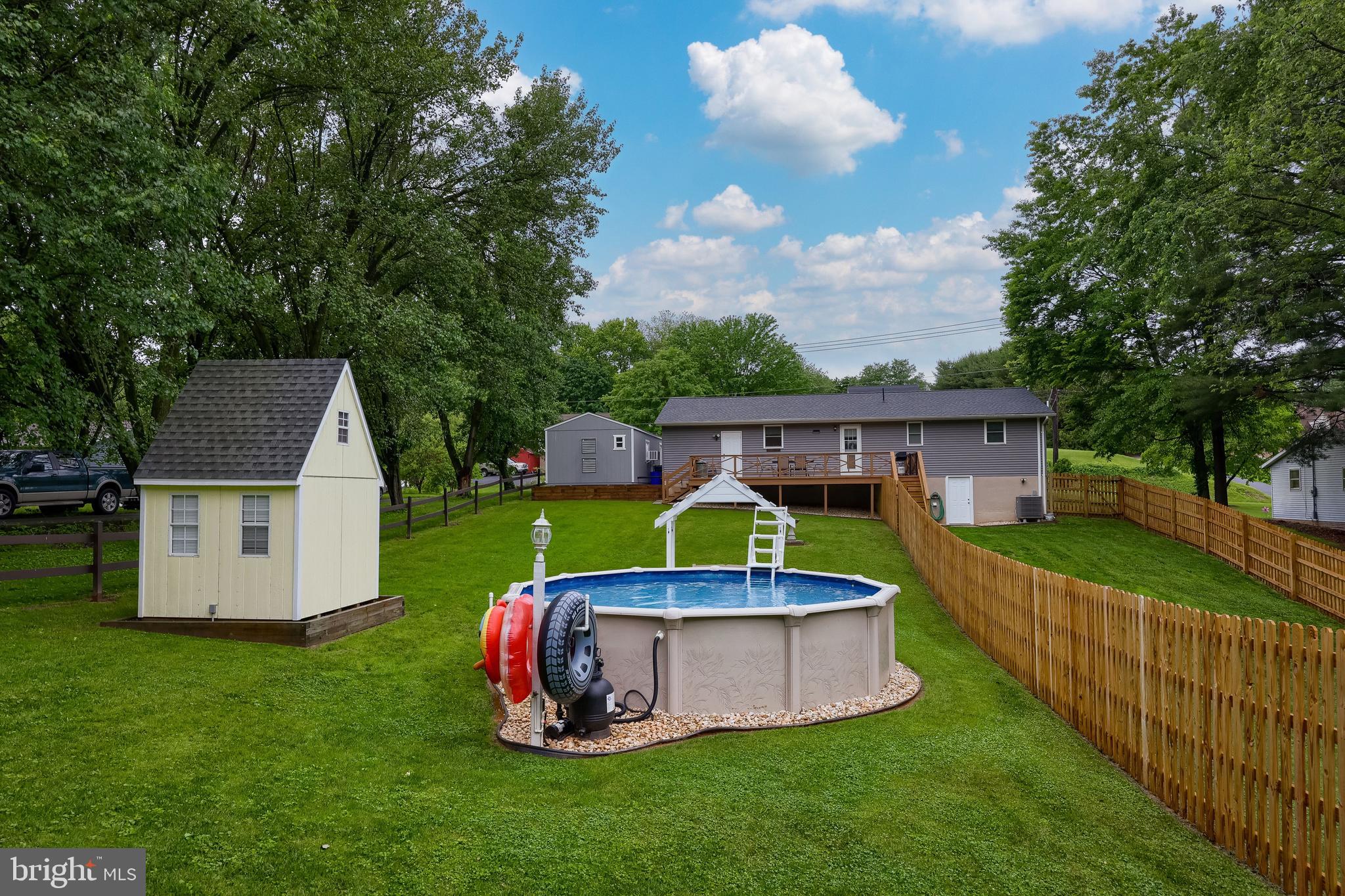 699 River Corner Road Conestoga, PA 17516 - Photo 27 of 37 a view of a house with a yard and sitting area