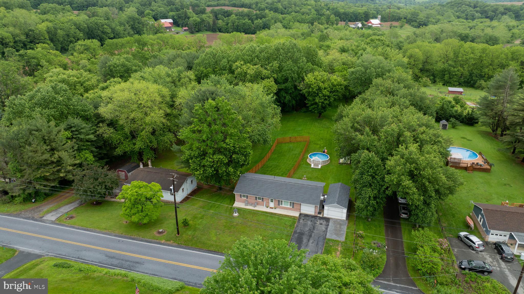 699 River Corner Road Conestoga, PA 17516 - Photo 3 of 37 an aerial view of a house with yard