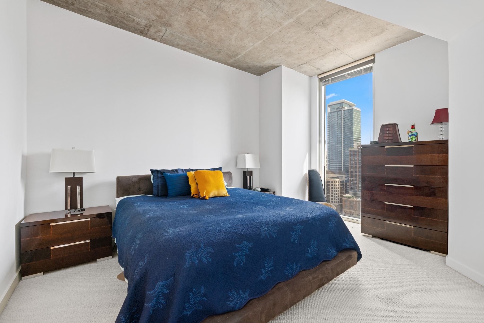 360 Nueces Street, Unit 2105 Austin, TX 78701 - Photo 18 of 35 Primary bedroom with view of downtown and lake