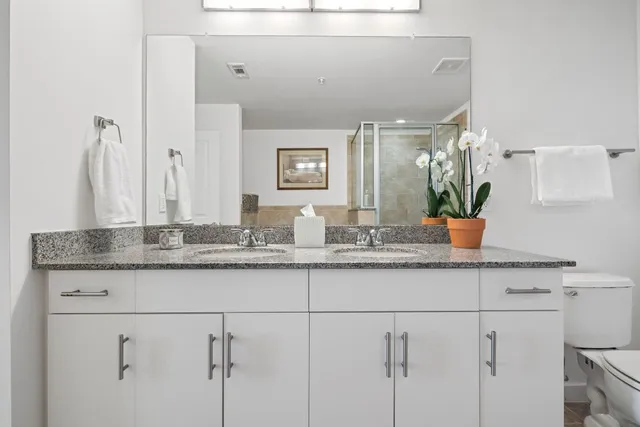 a bathroom with a tub and shower