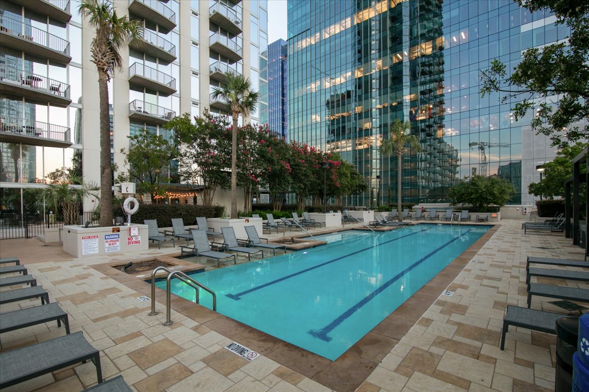 360 Nueces Street, Unit 2105 Austin, TX 78701 - Photo 29 of 35 Resort style lap pool with cabanas and tons of seating
