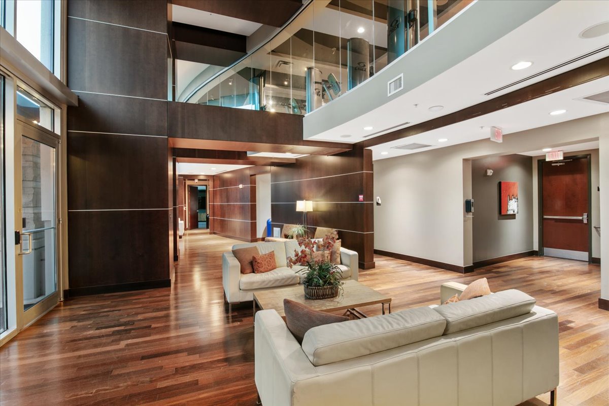 360 Nueces Street, Unit 2105 Austin, TX 78701 - Photo 32 of 35 Residents lounge with library, media room, kitchen and billiards