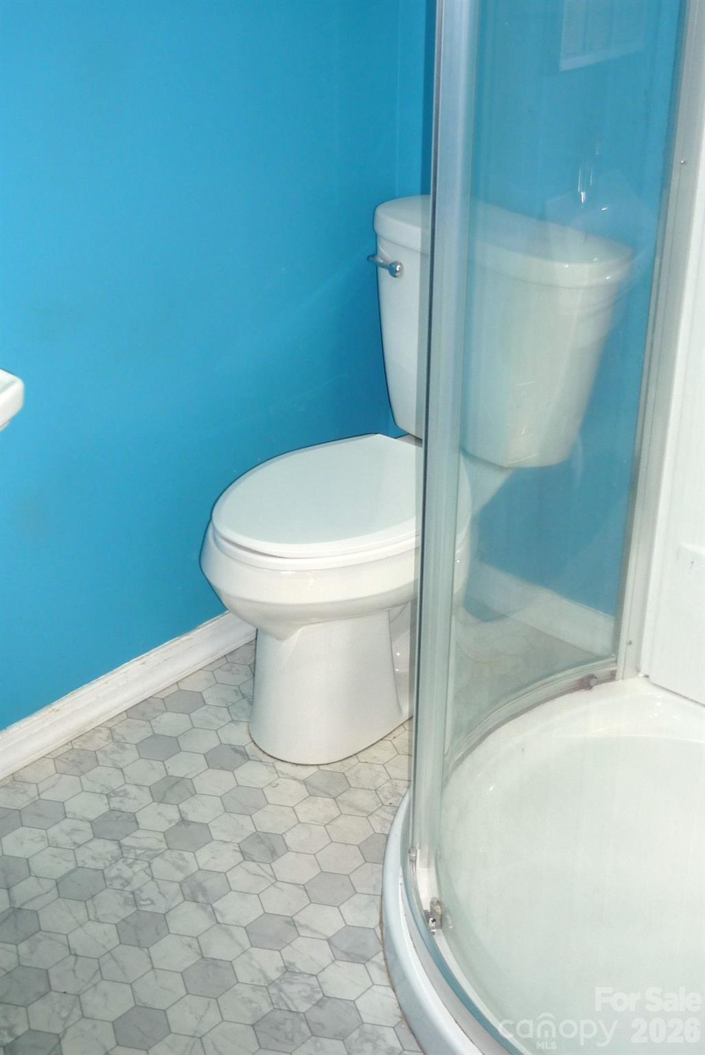 120 Bradley Road Shelby, NC 28152 - Photo 25 of 42 a bathroom with a toilet and a shower