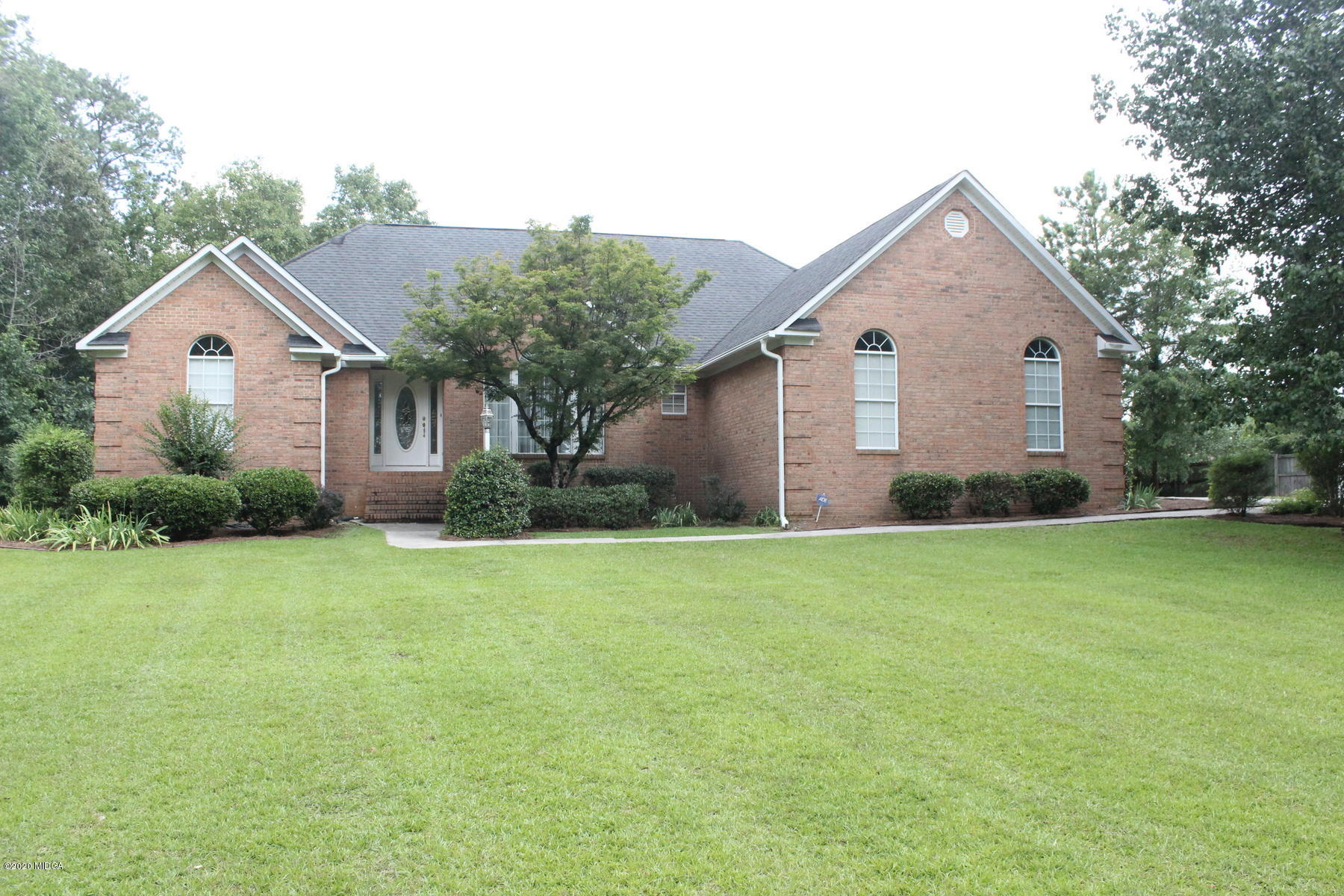 144 Gates Road Lizella, GA 31052 - Photo 2 of 44 a front view of house with yard and green space