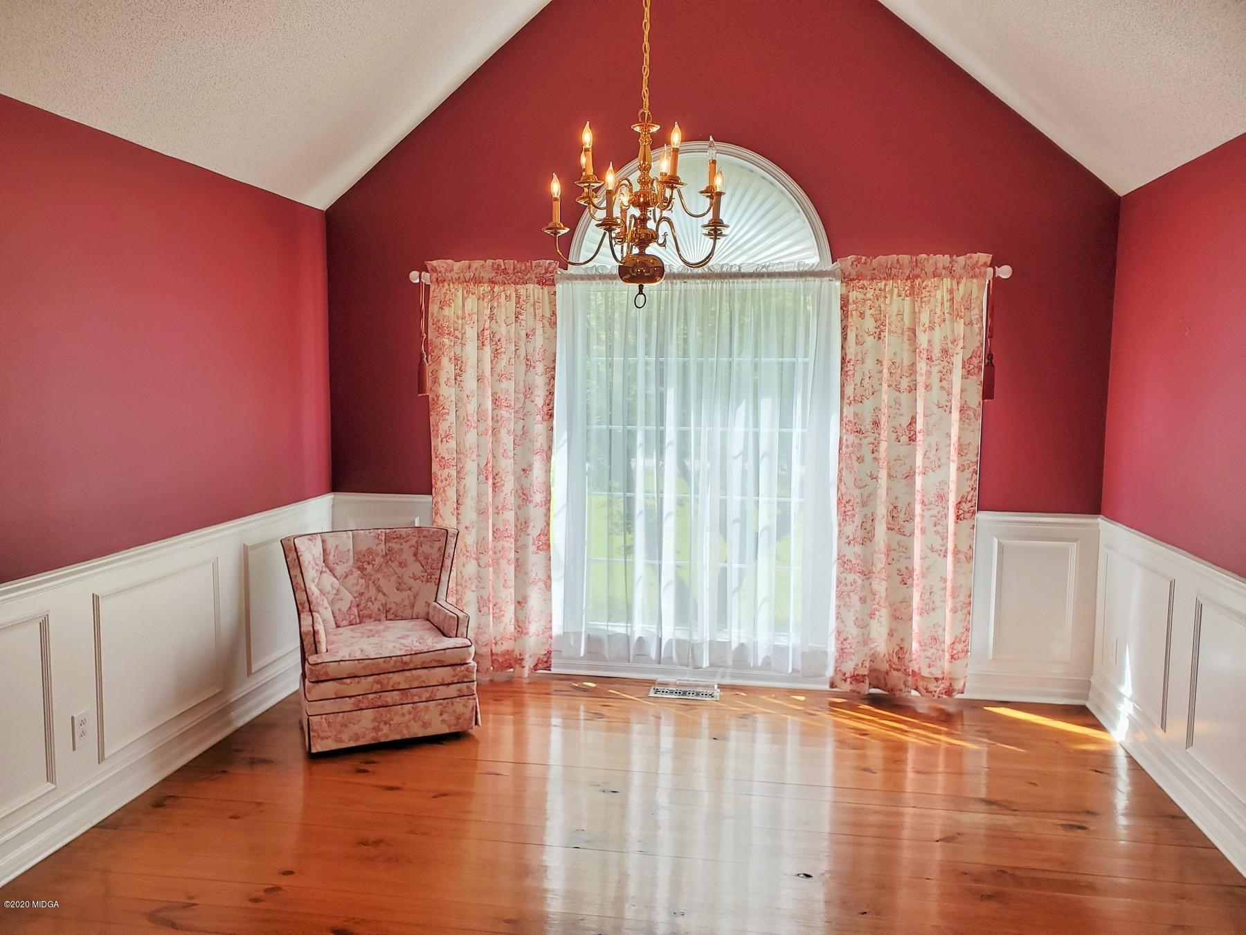 144 Gates Road Lizella, GA 31052 - Photo 18 of 44 a living room with furniture and a large window