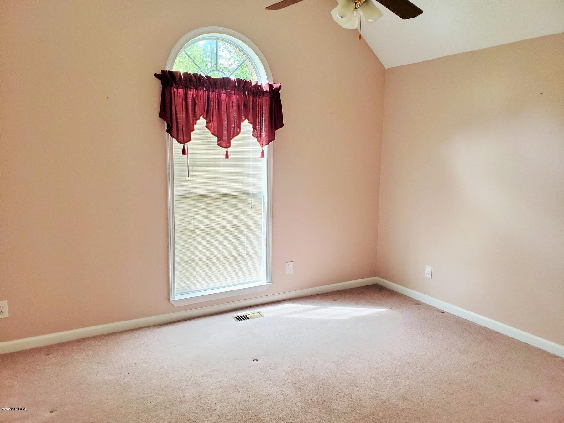 144 Gates Road Lizella, GA 31052 - Photo 33 of 44 an empty room with a window