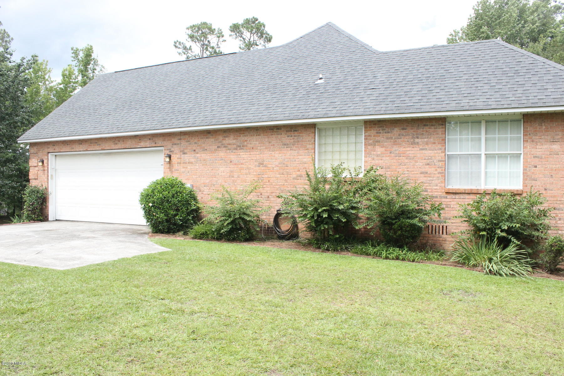 144 Gates Road Lizella, GA 31052 - Photo 5 of 44 a front view of a house with garden