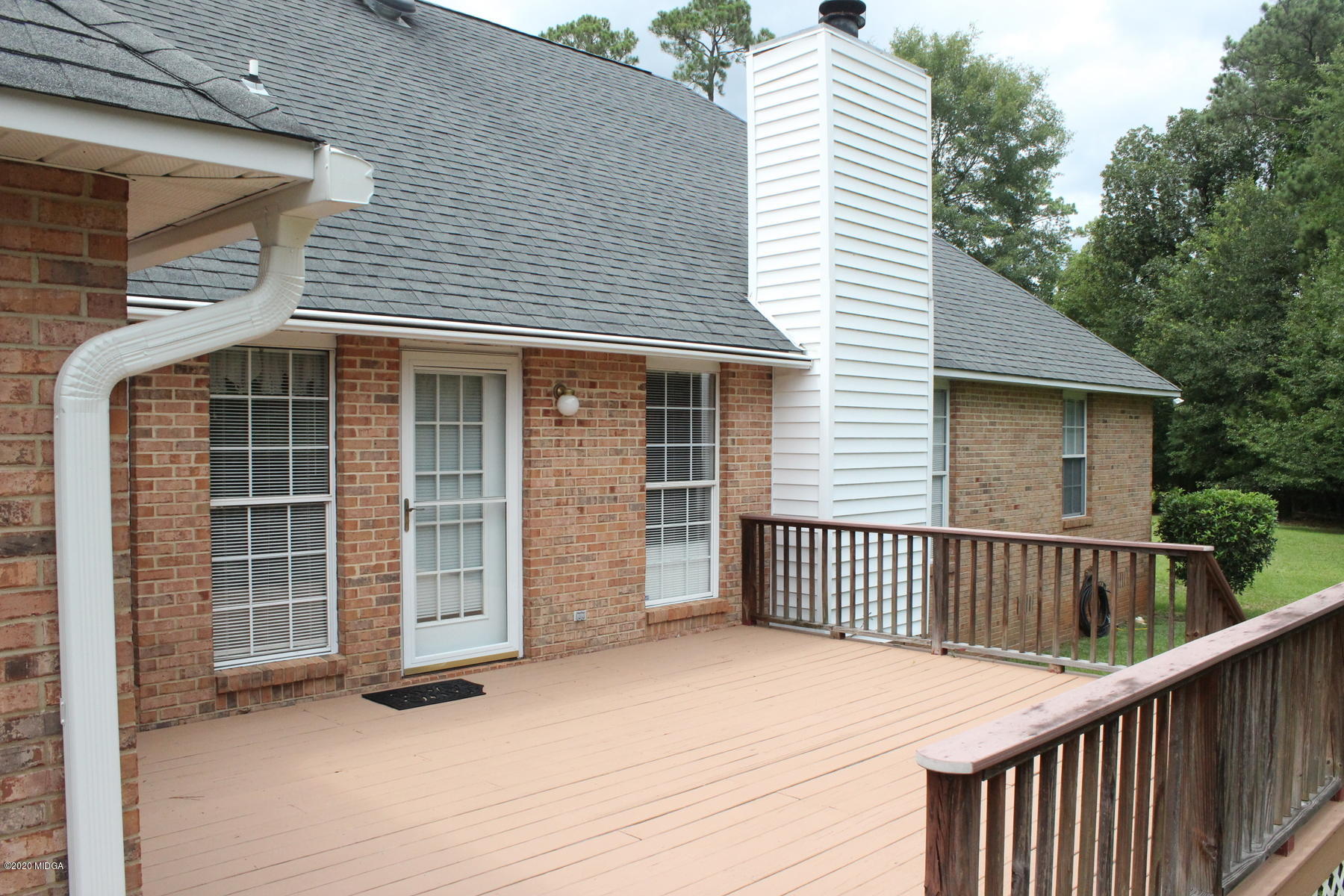 144 Gates Road Lizella, GA 31052 - Photo 41 of 44 a front view of a house with a garage