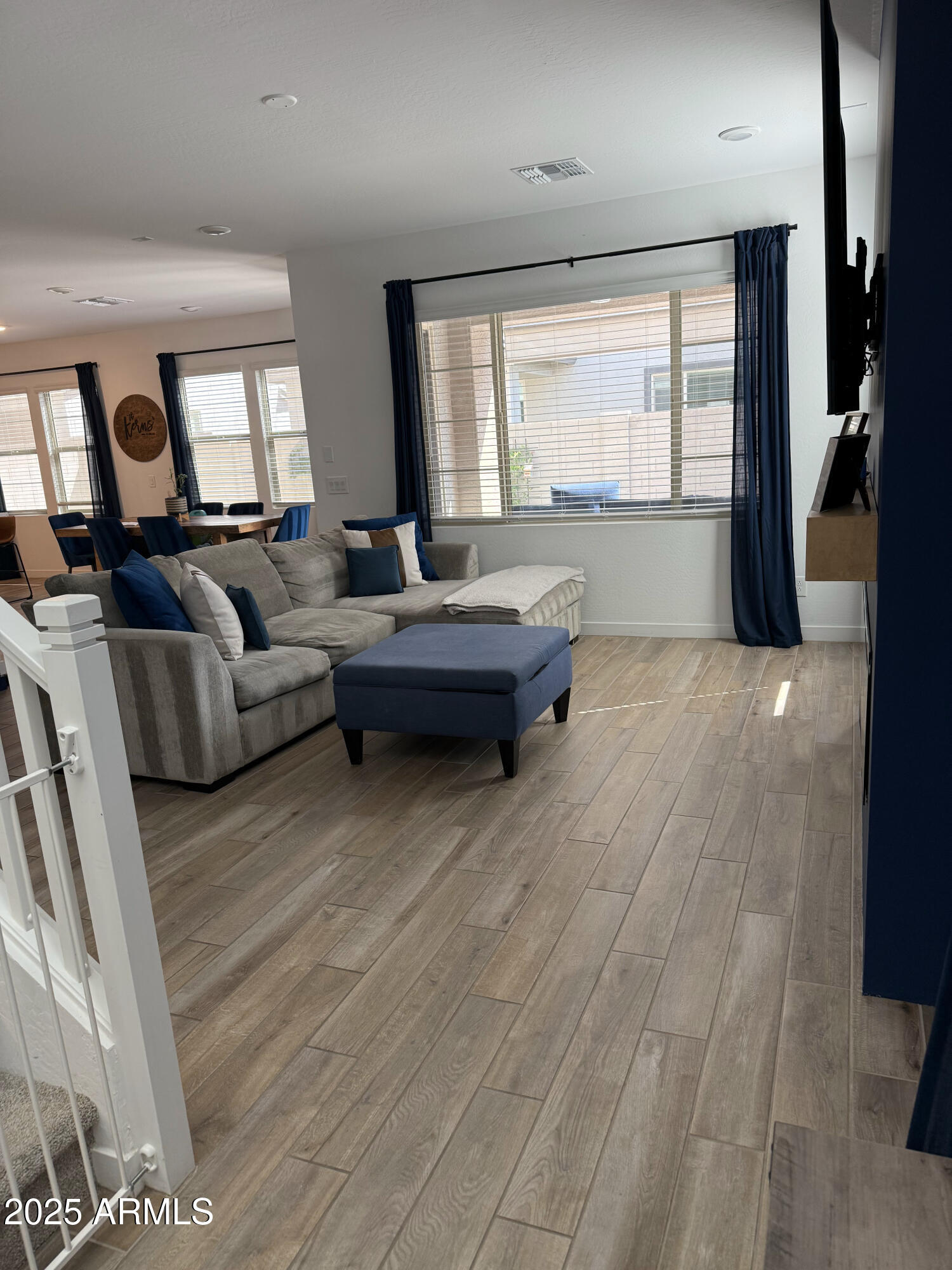 9223 East Sphere Avenue Mesa, AZ 85212 - Photo 3 of 14 a living room with furniture and a large window
