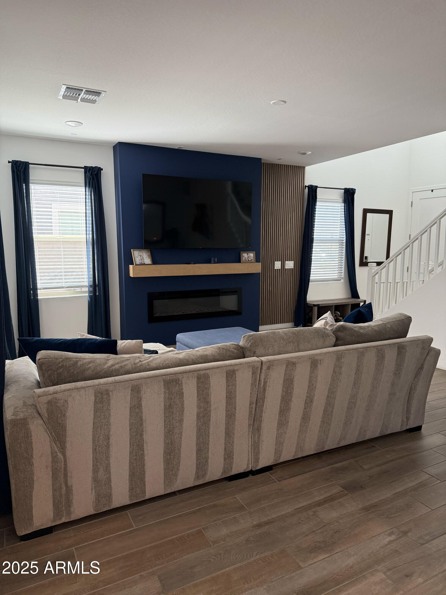 9223 East Sphere Avenue Mesa, AZ 85212 - Photo 5 of 14 a living room with furniture and a flat screen tv