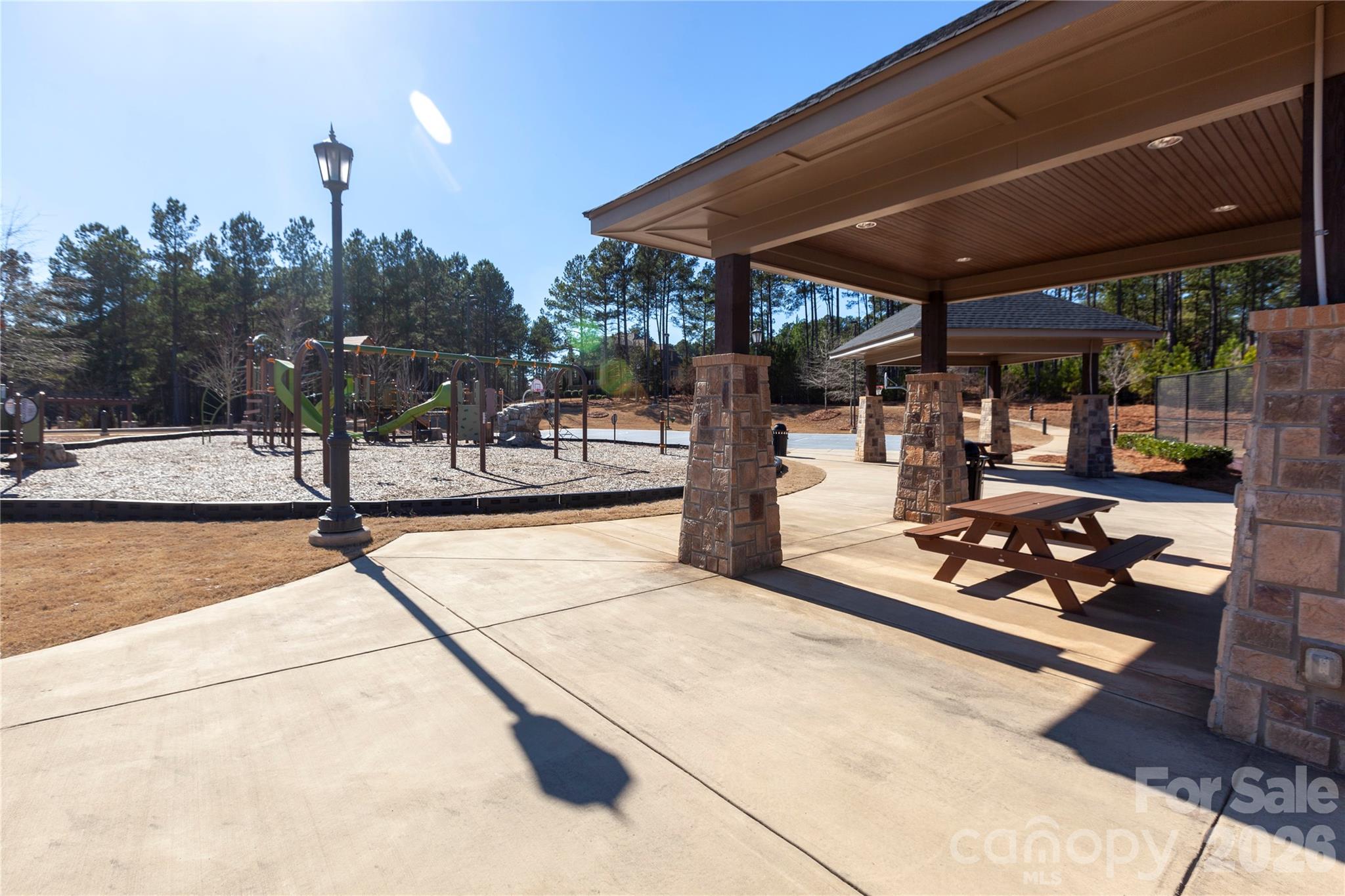 3249 Sherman Drive Lancaster, SC 29720 - Photo 18 of 29 a view of a patio with a table and chairs