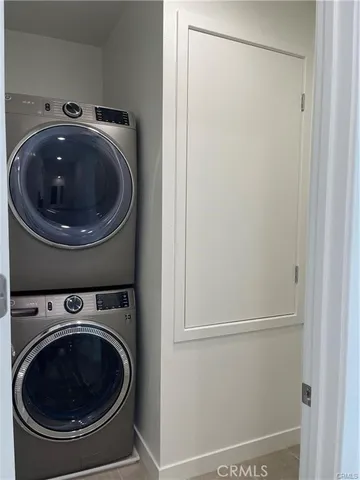 a view of a building with a swimming pool and sitting area