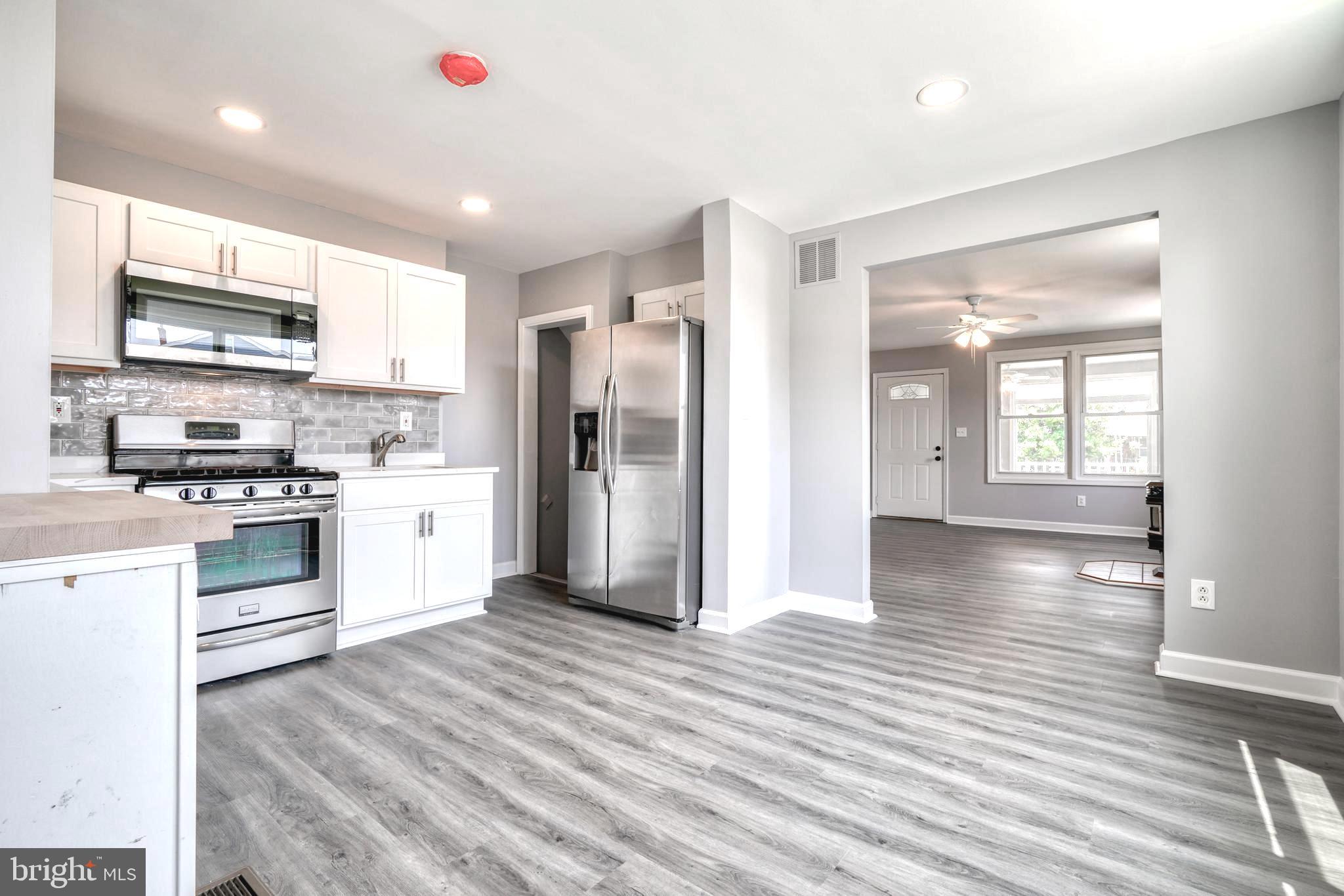 8341 Kavanagh Road Dundalk, MD 21222 - Photo 1 of 61 RENOVATED 4BD/2BA EOG TH w/SUNRM, FAM RM, GARAGE!