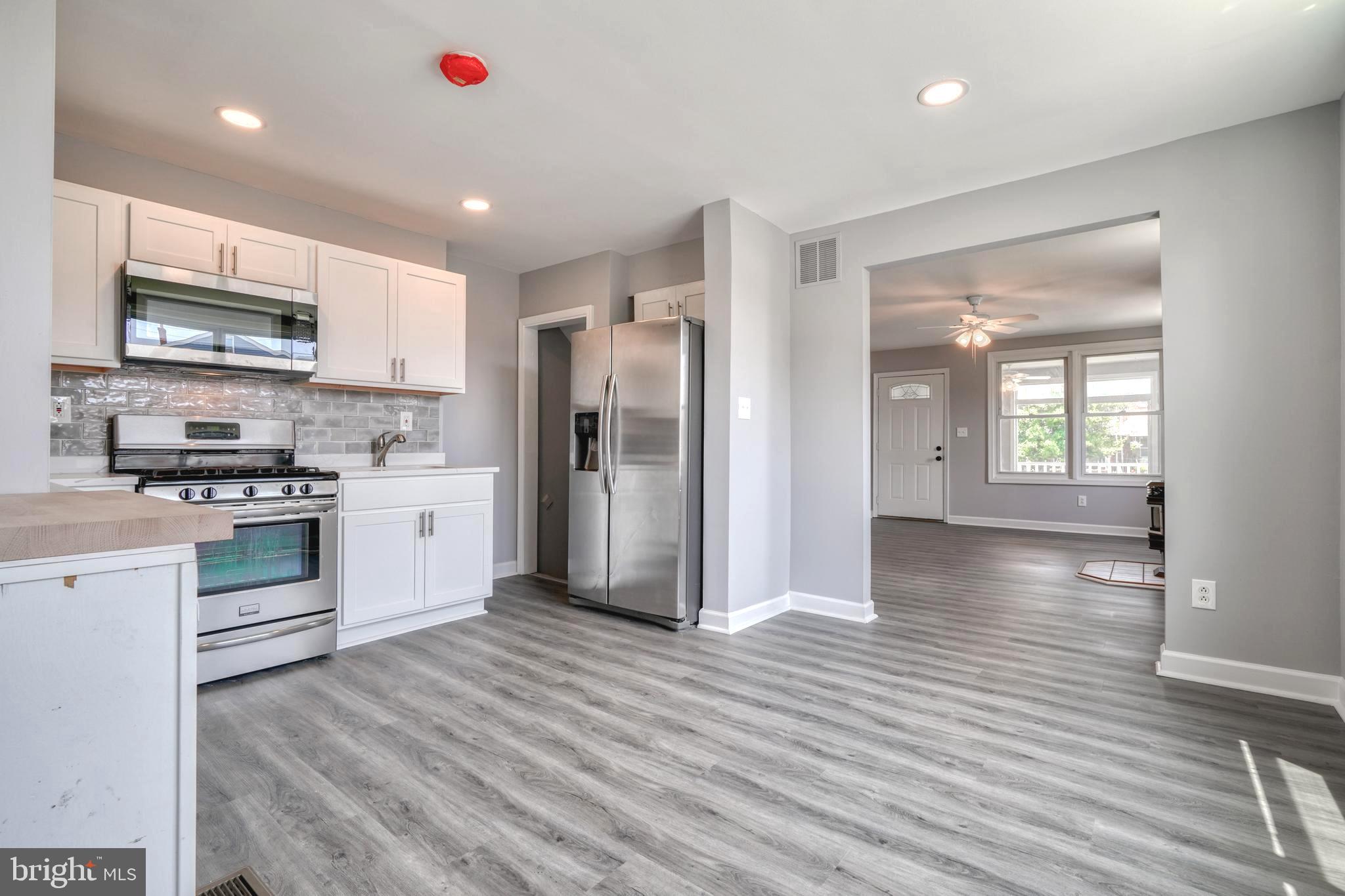 8341 Kavanagh Road Dundalk, MD 21222 - Photo 27 of 61 RECESSED LIGHTING, WATERPROOF LUXURY VINYL PLANK!