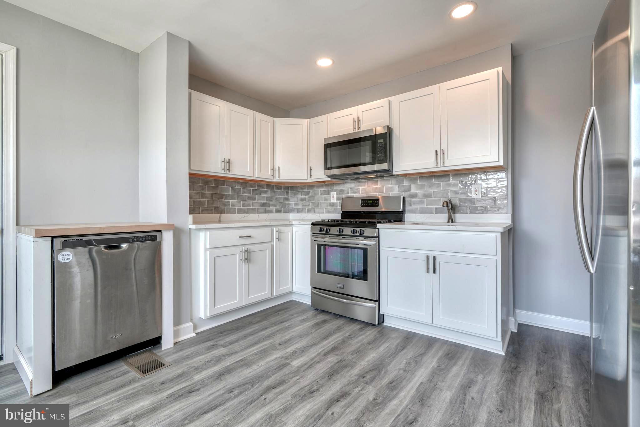 8341 Kavanagh Road Dundalk, MD 21222 - Photo 28 of 61 QUARTZ COUNTERS, S/S APPL, XTRA DEEP SINK!