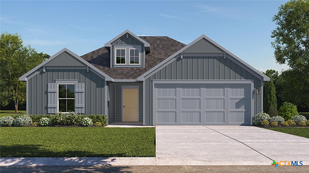 312 Timbo Drive Jarrell, TX 76537 - Photo 1 of 1 a front view of a house with a yard and garage