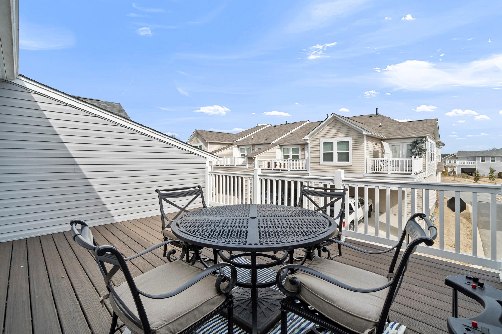1564 Galloway Road Charlotte, NC 28262 - Photo 18 of 37 a view of a patio with a table and chairs
