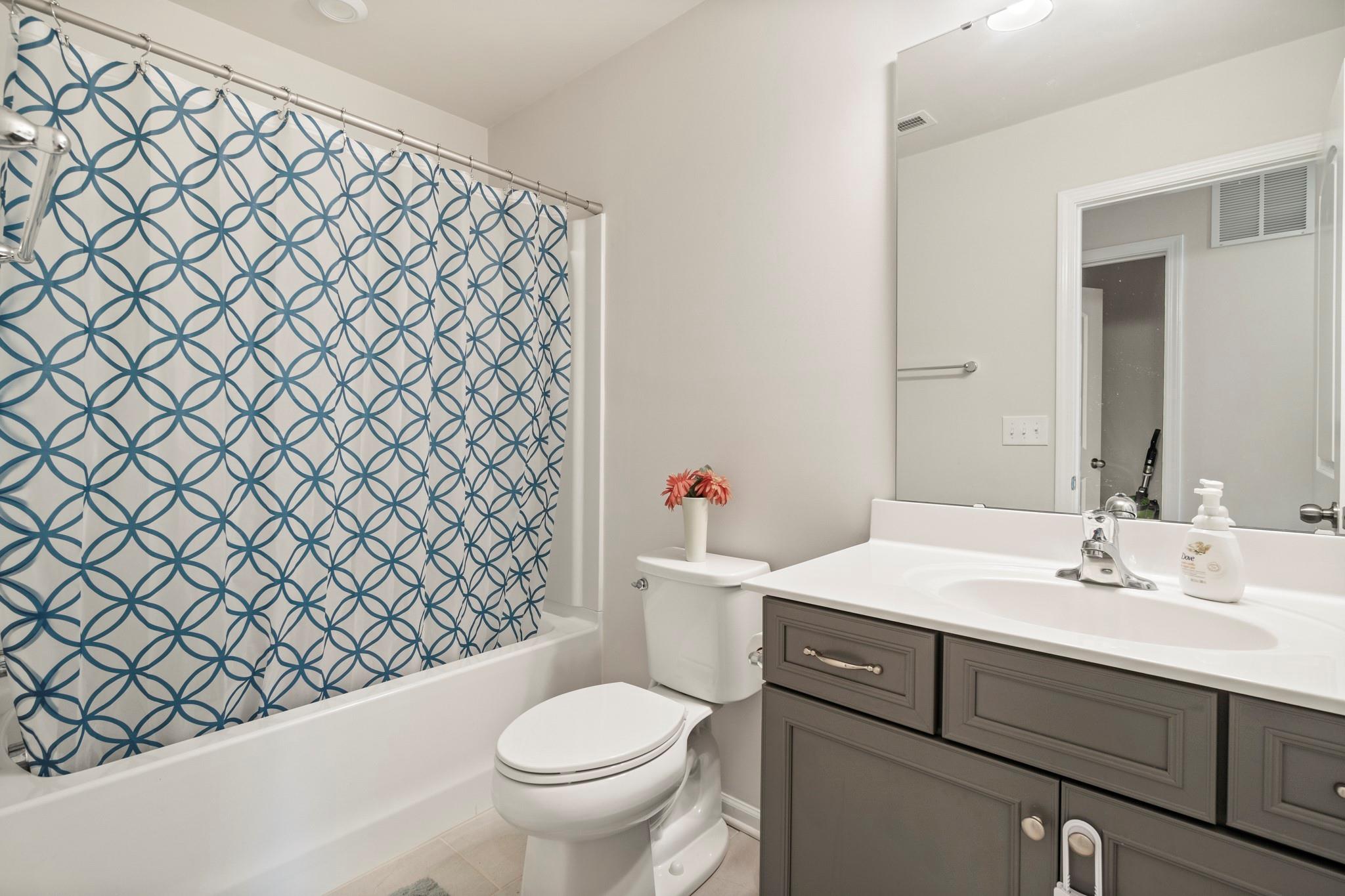 1564 Galloway Road Charlotte, NC 28262 - Photo 30 of 37 a bathroom with a sink and a toilet