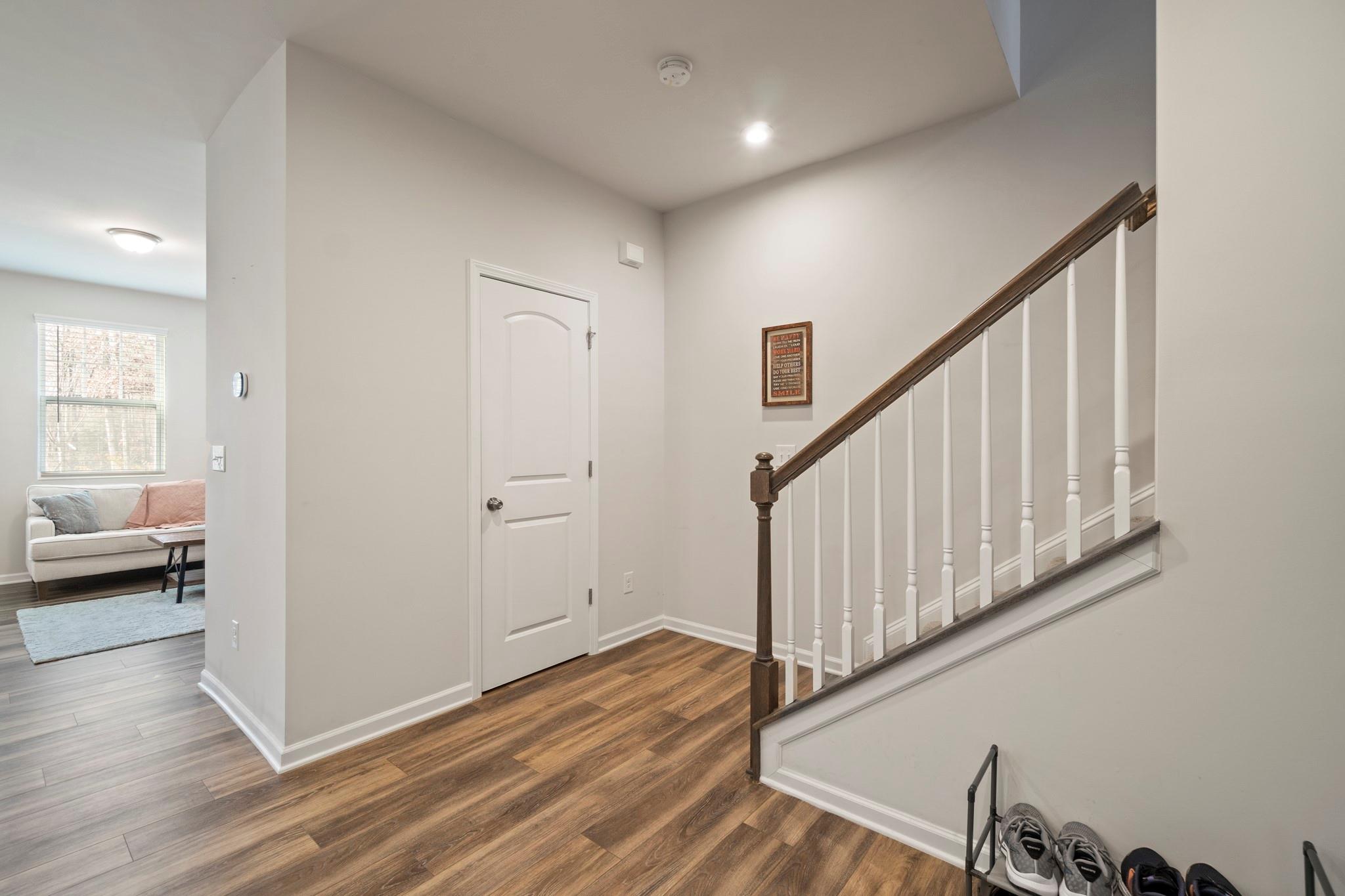 1564 Galloway Road Charlotte, NC 28262 - Photo 4 of 37 a view of a hallway with wooden floor and entryway