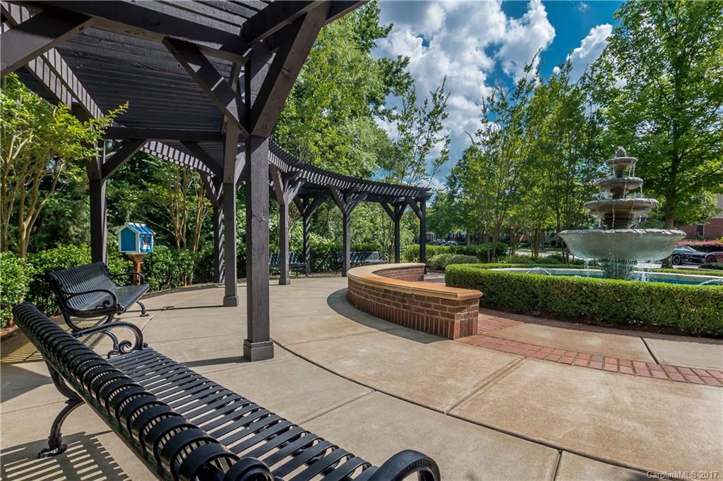 916 Lyndley Drive Fort Mill, SC 29708 - Photo 21 of 21 a view of a backyard with sitting area and furniture